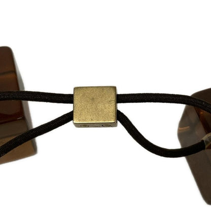 Louis Vuitton Hair Cube Clear Chocolate Tie