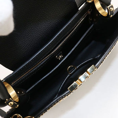 Louis Vuitton Capucines PM Taurillon Handbag Leather
