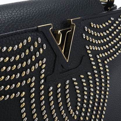 Louis Vuitton Capucines PM Taurillon Handbag Leather
