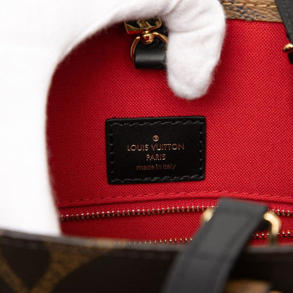 Louis Vuitton Monogram Giant Reverse on the Go MM 2-Way Shoulder Bag Brown