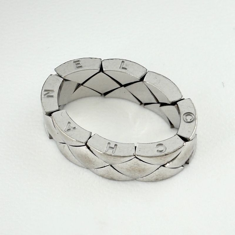 Chanel Quilted Ring Ation on the metal.