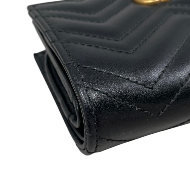 Gucci Bifold Wallet Double Quilted Leather Logo Black Gold