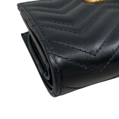 Gucci Bifold Wallet Double Quilted Leather Logo Black Gold