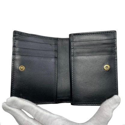 Gucci Bifold Wallet Double Quilted Leather Logo Black Gold