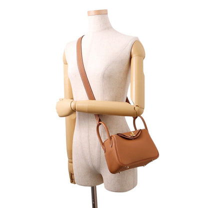 Hermes Lindy Mini Gold Taurillon Clemence 2-Way Handbag
