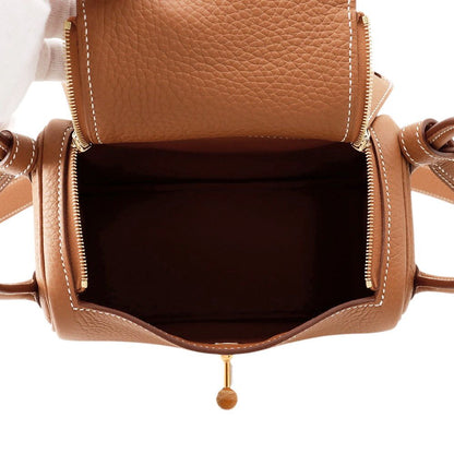 Hermes Lindy Mini Gold Taurillon Clemence 2-Way Handbag