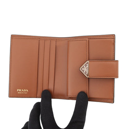 Prada Bifold Wallet City Calfskin Tab Triangle Logo Leather Compact