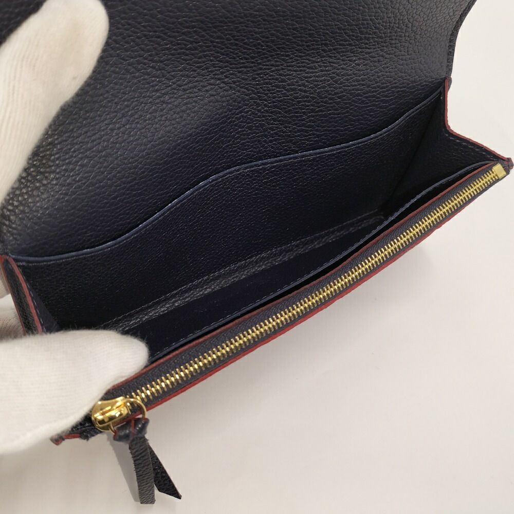 Louis Vuitton Portefeuille Emily Bifold Wallet Marine Monogram Empreinte — view 8