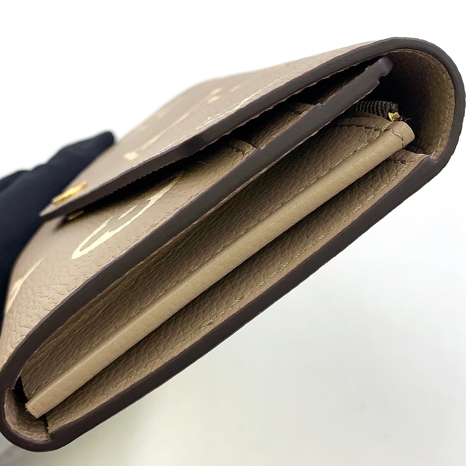Louis Vuitton Portefeuille Sarah Monogram Empreinte Leather Beige White Bifold — view 6