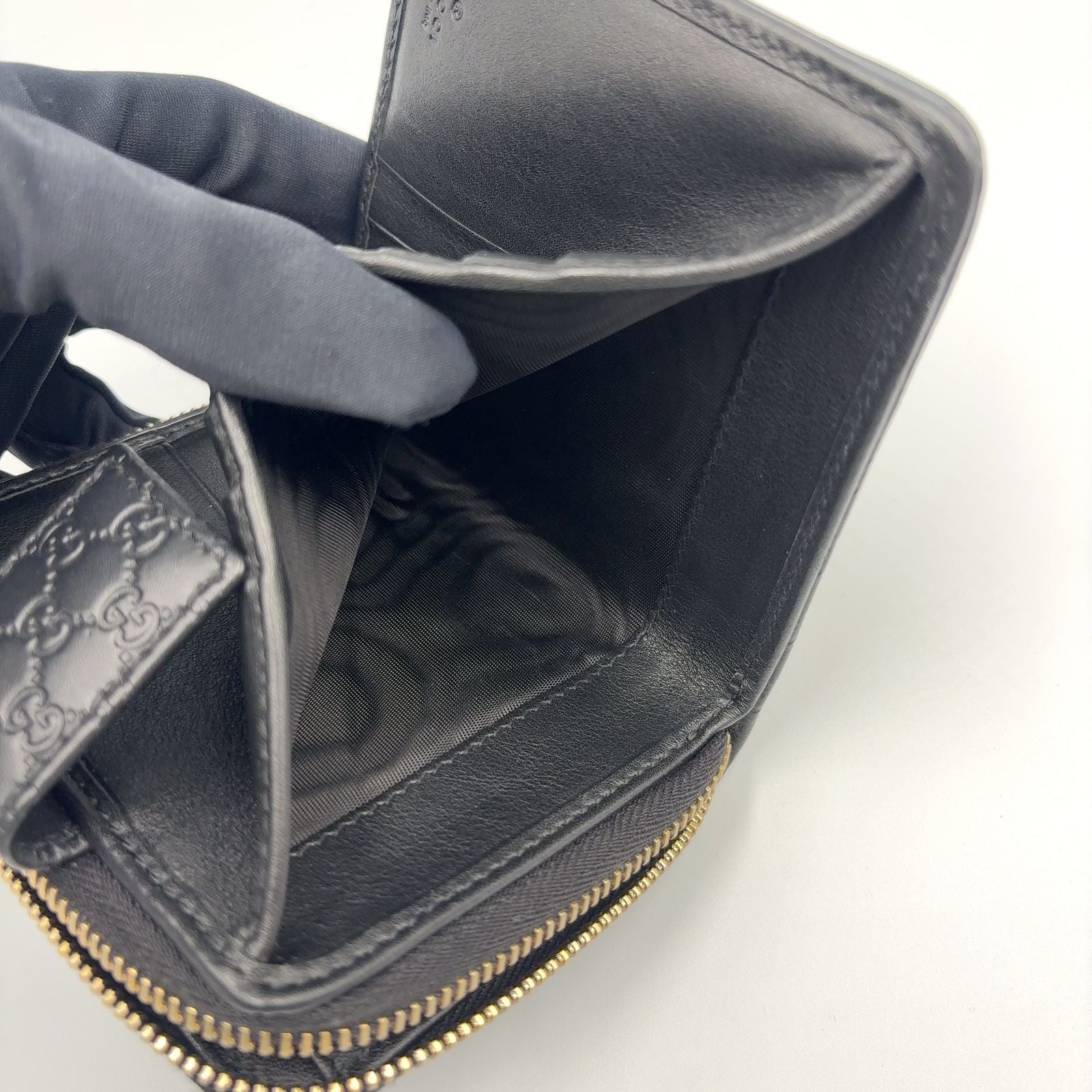 Gucci Micro GG Guccissima Bifold Leather Black Wallet Gold — view 6