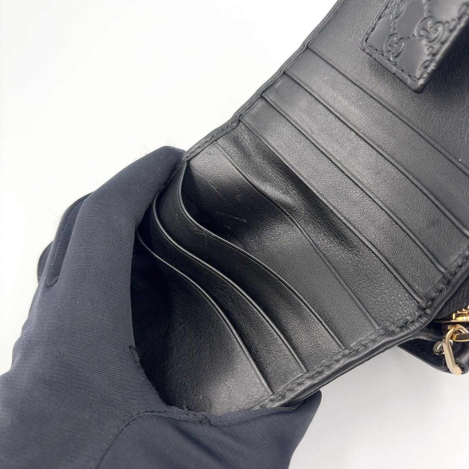 Gucci Micro GG Guccissima Bifold Leather Black Wallet Gold — view 9