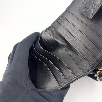 Gucci Micro GG Guccissima Bifold Leather Black Wallet Gold — view 9