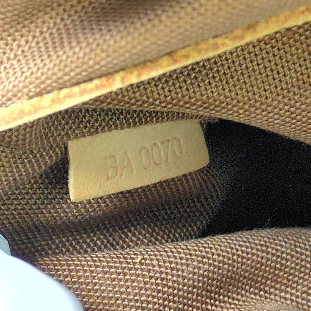 Louis Vuitton Monogram Alma Drawstring Handbag Brown All