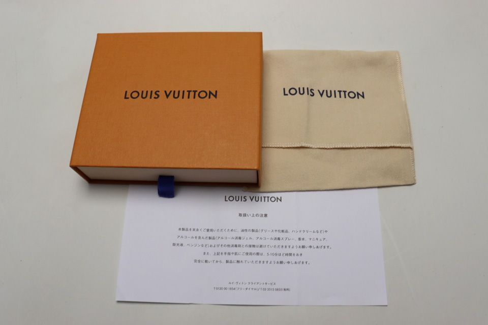 Louis Vuitton Monogram Giant Reverse Portefeuille Lou Leather Bifold Wallet — view 8