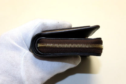 Louis Vuitton Monogram Giant Reverse Portefeuille Lou Leather Bifold Wallet — view 9