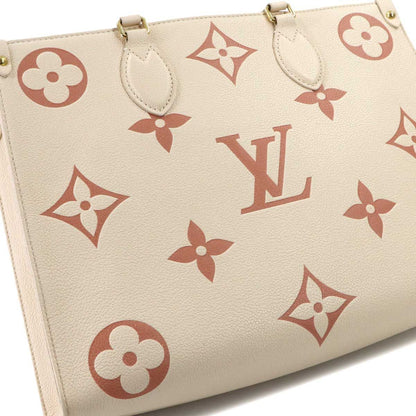 Louis Vuitton Bicolor Monogram Empreinte On The Go MM 2-Way Tote Cles MM — view 9