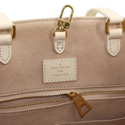 Louis Vuitton Bicolor Monogram Empreinte On The Go MM 2-Way Tote Cles MM — view 8