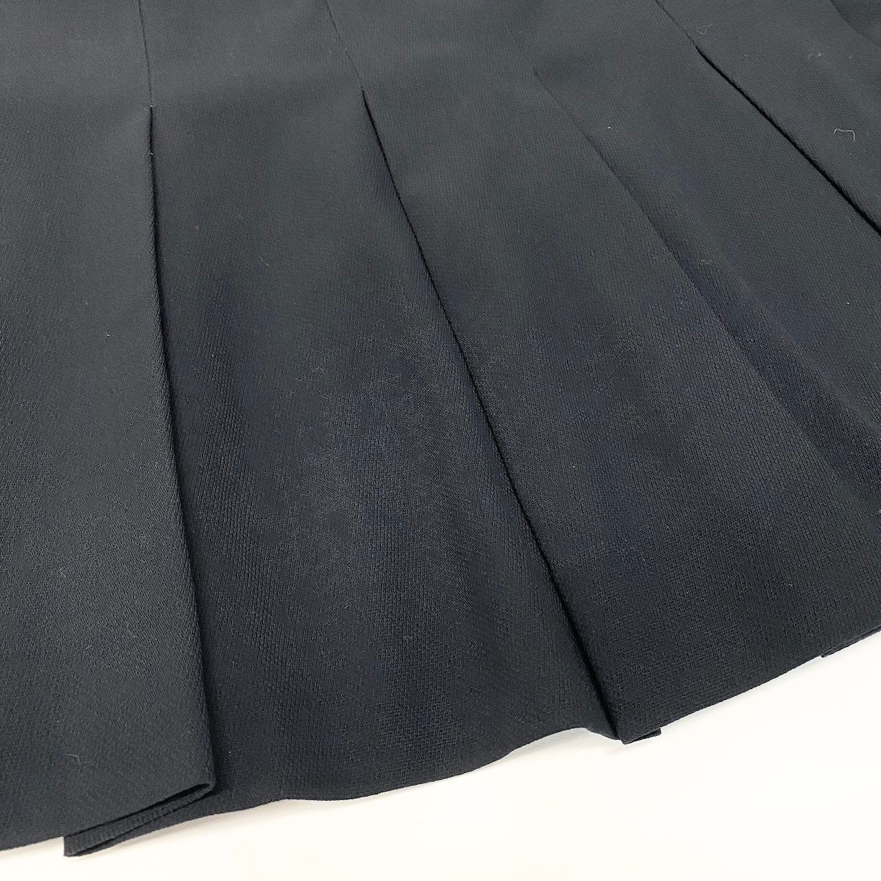 Chanel Boutique Pleated Skirt Knee Length CC Logo Button Navy Wool — view 6