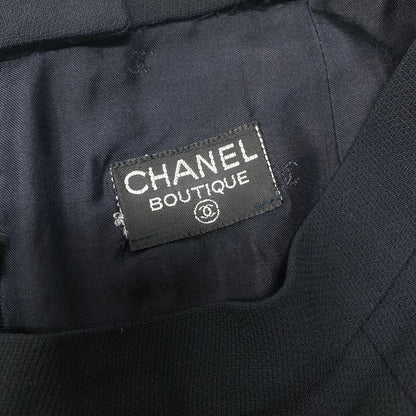 Chanel Boutique Pleated Skirt Knee Length CC Logo Button Navy Wool — view 9