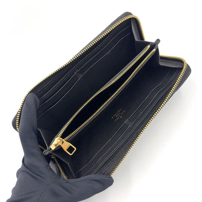 Louis Vuitton Portefeuille Clemence Monogram Empreinte Leather Black Round — view 3
