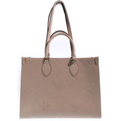 Louis Vuitton Monogram Empreinte On The Go MM Tote Beige Leather Gold