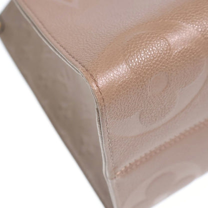 Louis Vuitton Monogram Empreinte On The Go MM Tote Beige Leather Gold — view 6