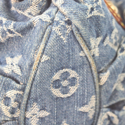 Louis Vuitton Monogram Denim Pleaty Handbag — view 8