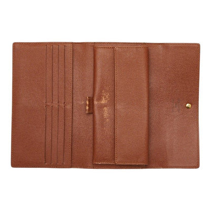 Louis Vuitton Monogram Portefeuille International Wallet Brown Leather — view 8