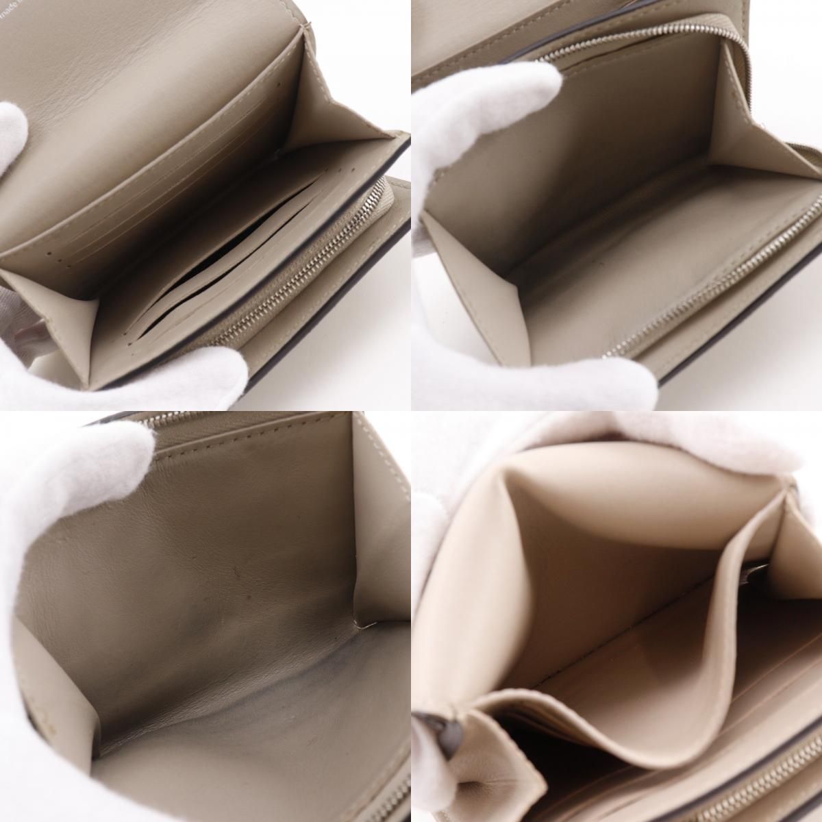 Louis Vuitton Portefeuille Iris Compact Monogram Mahina Gale Gray Bifold Wallet — view 8