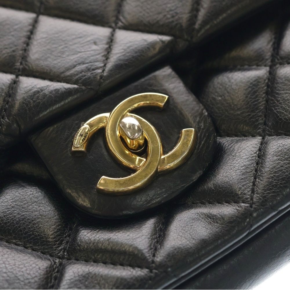 Chanel Quilted Shoulder Bag Black Lambskin Bag Gold Slide Adjuster Star — view 5