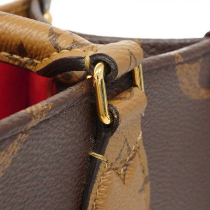 Louis Vuitton Handbag Monogram Giant Reverse On The Go PM Brown 2-Way Bag — view 7