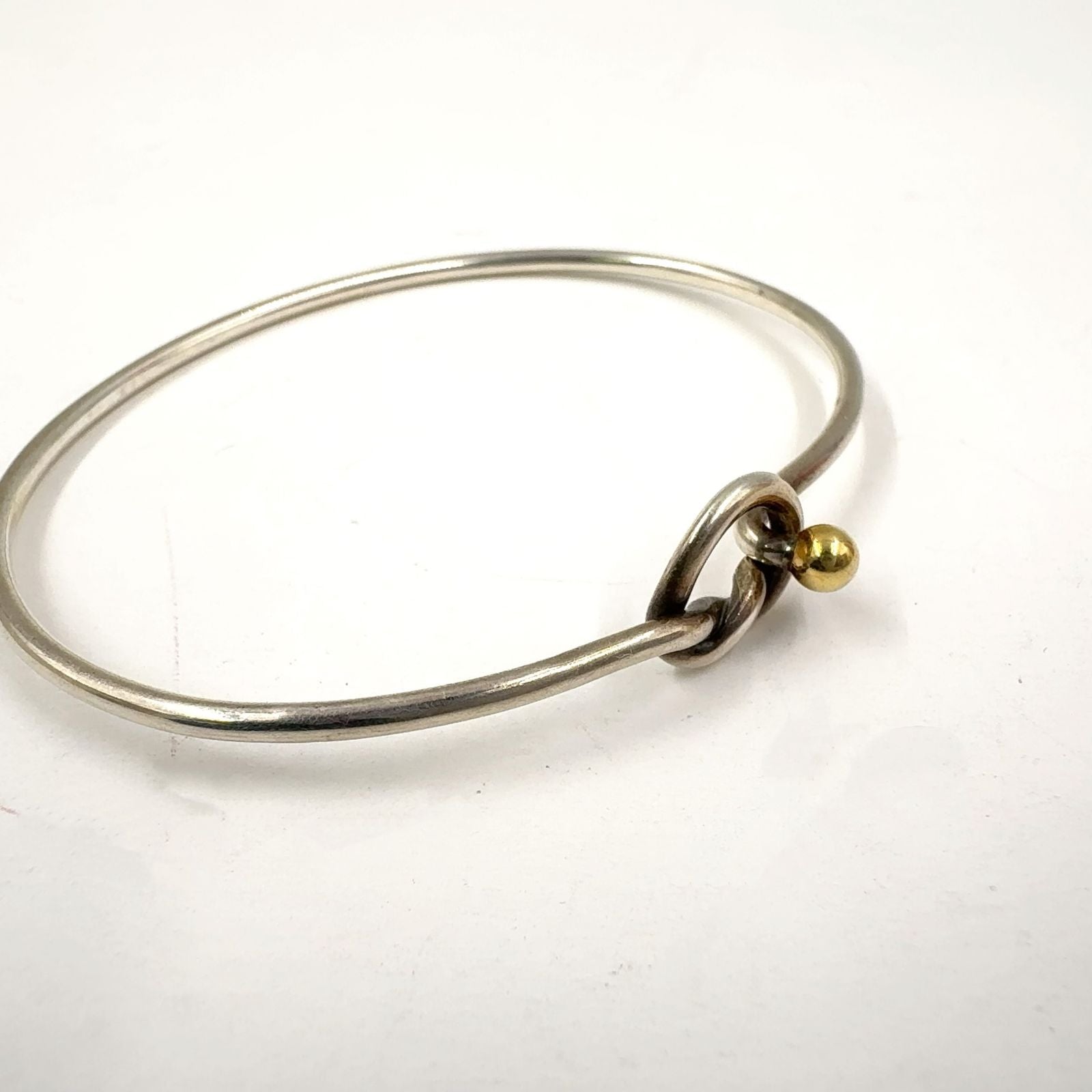 Tiffany & Co Love Knot 18k Yellow Gold Silver Bangle Bracelet — view 3