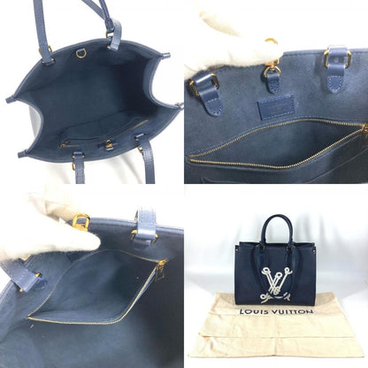 Louis Vuitton Shoulder Bag On The Go MM Leather Navy — view 9