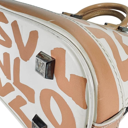 Louis Vuitton Steven Sprouse Graffiti Alma MM Handbag Beige — view 6