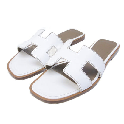 Hermes Oran Sandals Logo