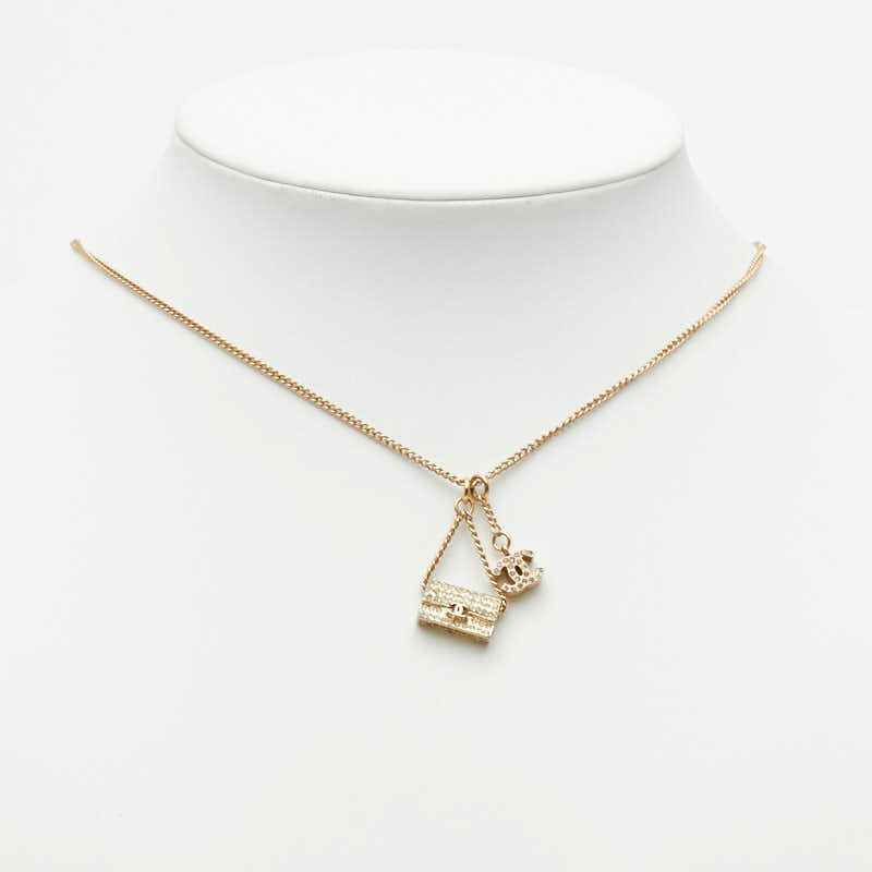 Chanel CC Logo Quilted Bag Motif Chain Pendant Necklace Gold Line Stone Plated — view 8