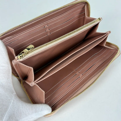 Louis Vuitton Zippy Wallet Zip Around Monogram Embossed Leather Rose Gold — view 6