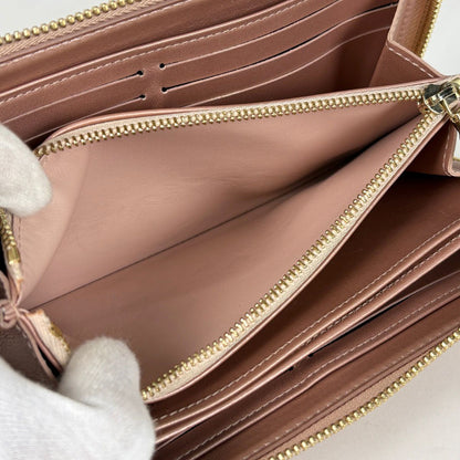 Louis Vuitton Zippy Wallet Zip Around Monogram Embossed Leather Rose Gold — view 7