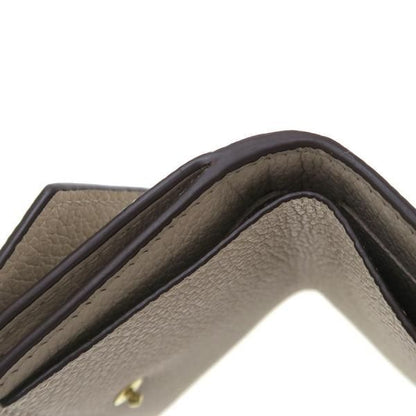 Louis Vuitton Portefeuille Lock Mini Wallet — view 7