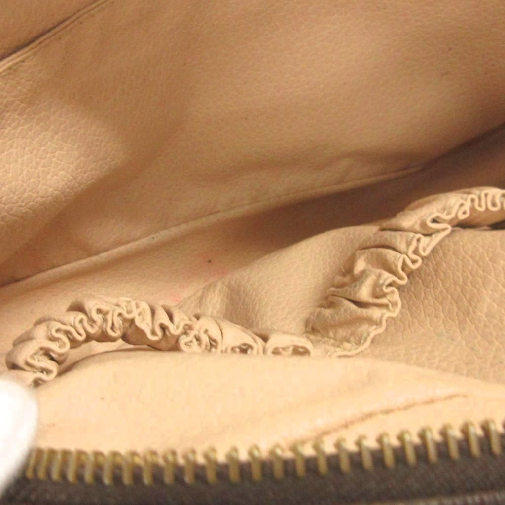 Louis Vuitton Tourtoilet Pouch Second Monogram Leather Brown — view 7