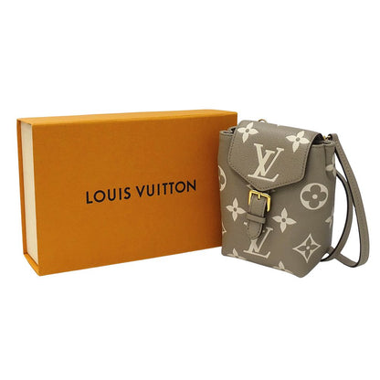 Louis Vuitton Bicolor Monogram Empreinte Tiny Backpack Tourterelle Cles Beige — view 8