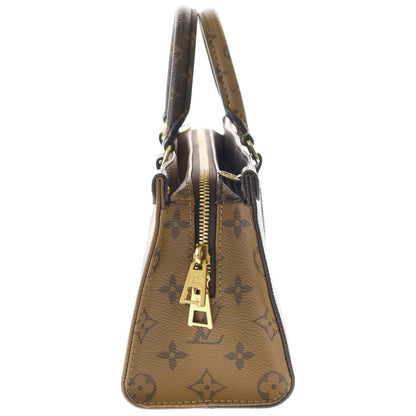 Louis Vuitton Monogram Giant Reverse On The Go East West Handbag Brown Leather — view 3