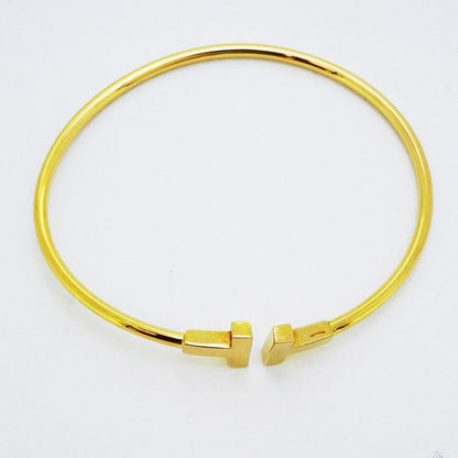 Tiffany & Co Bangle T Wire 18k Yellow Gold Bracelet — view 3
