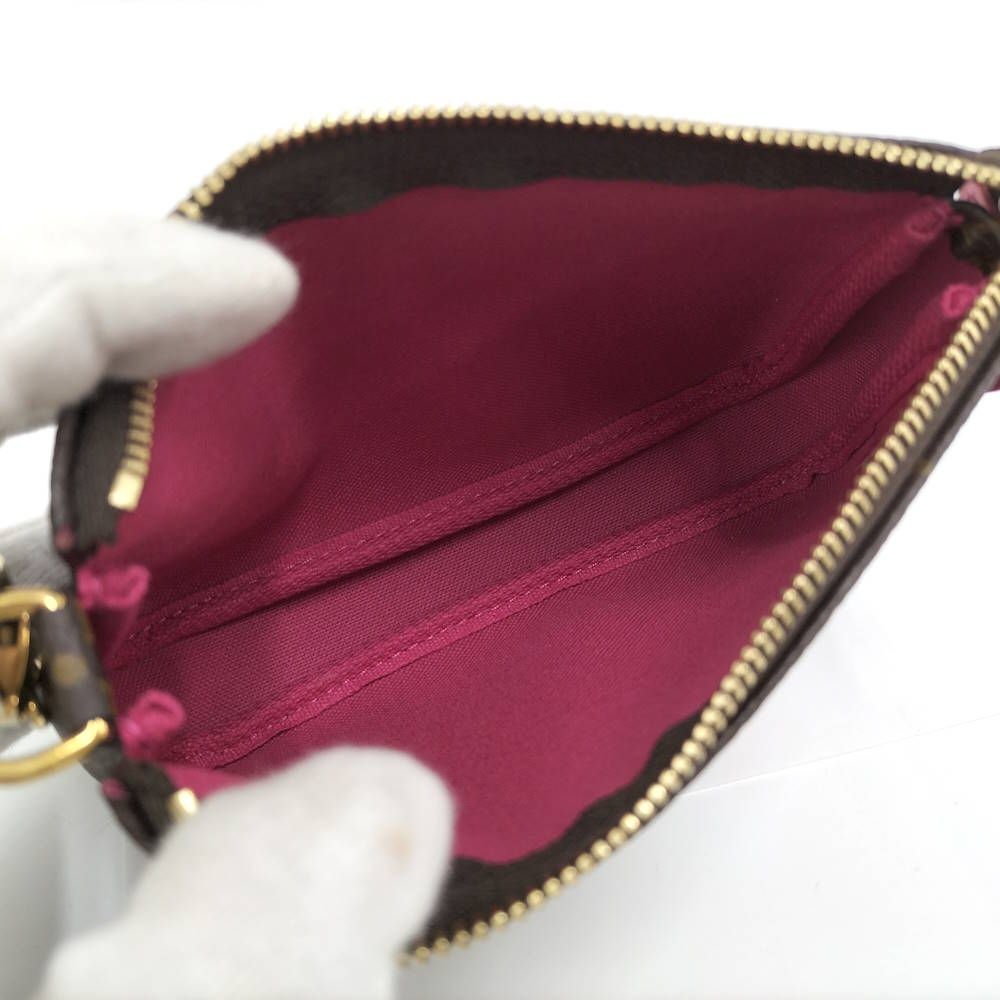 Louis Vuitton Pochette Monogram Vivienne Handbag — view 8