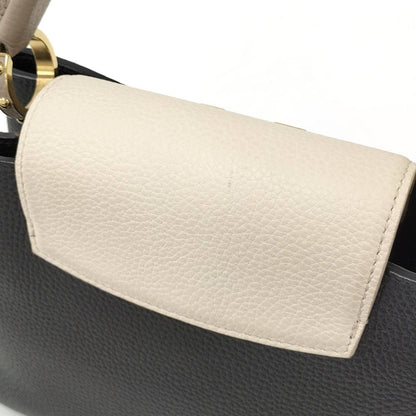 Louis Vuitton Capucines MM Handbag Taurillon Leather Black Cream — view 6
