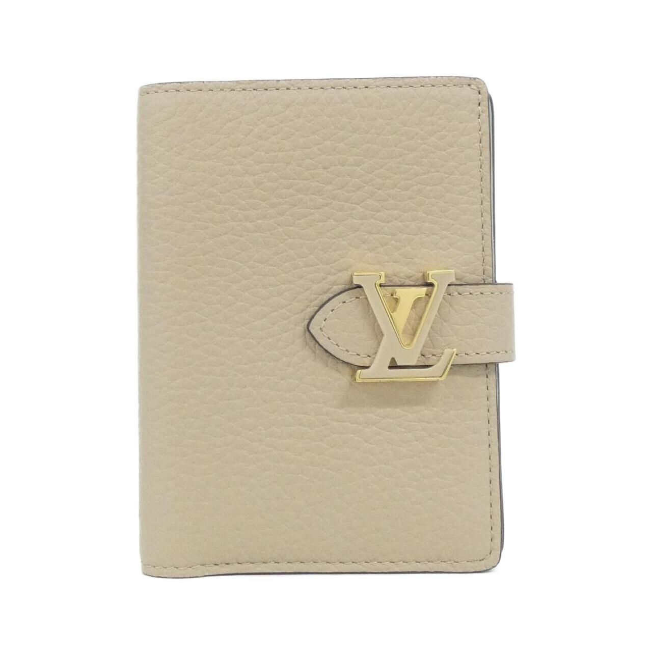 Louis Vuitton Taurillon LV Vertical Wallet Compact
