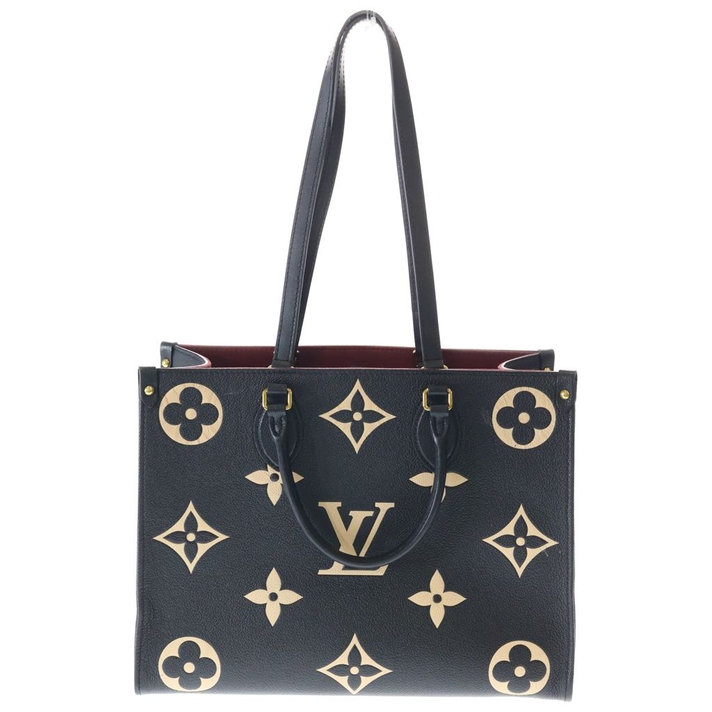 Louis Vuitton On The Go MM Monogram Empreinte Bicolor Leather Hand Tote Gold
