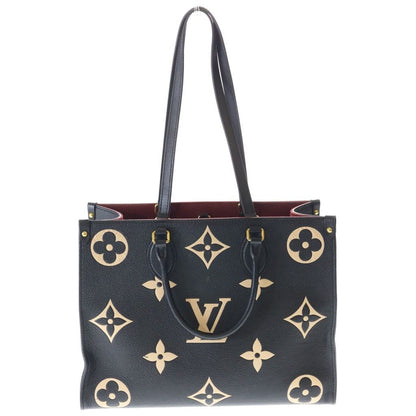 Louis Vuitton On The Go MM Monogram Empreinte Bicolor Leather Hand Tote Gold — view 2