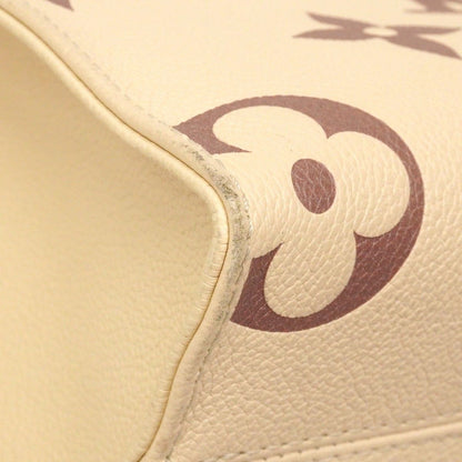 Louis Vuitton Handbag Monogram Empreinte Bicolor On The Go PM Cles Bois Droz — view 7