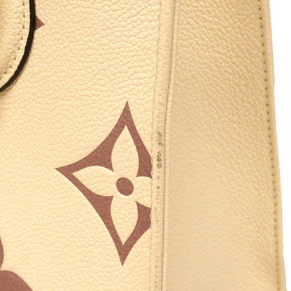 Louis Vuitton Handbag Monogram Empreinte Bicolor On The Go PM Cles Bois Droz — view 6